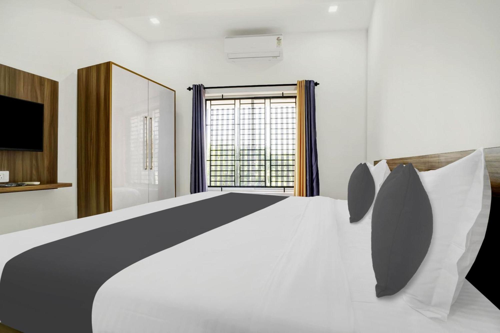 Hotel O Grand Parassini Pappinisseri Ngoại thất bức ảnh